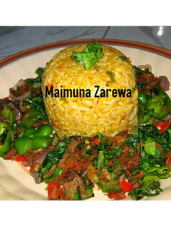 A picture of Curry rice and spinach sauce.