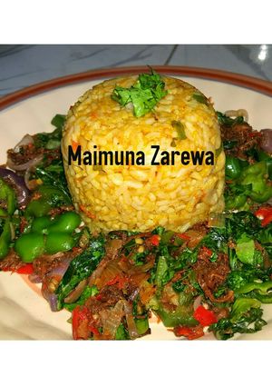 A picture of Curry rice and spinach sauce.