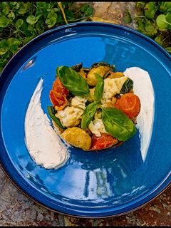 Una foto de Timbal de ñoquis con ricotta