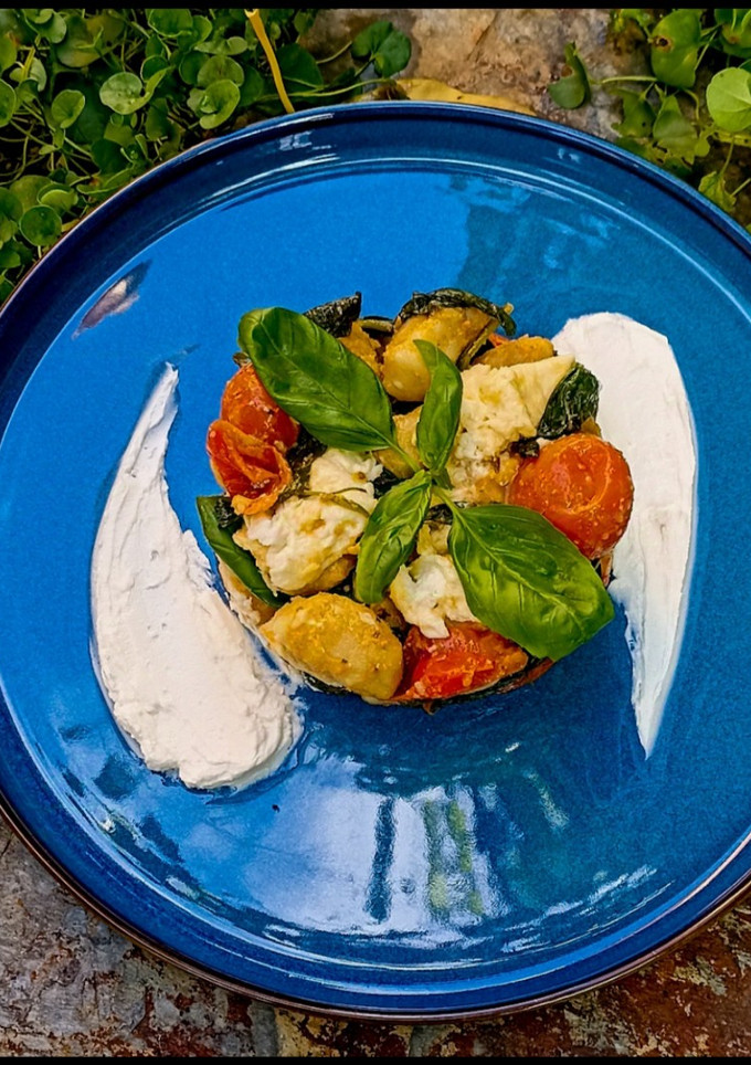 Una foto de Timbal de ñoquis con ricotta