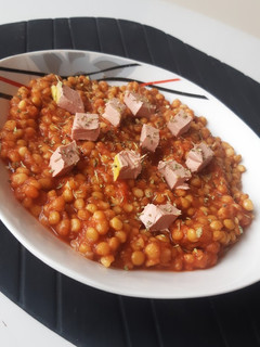Una foto de Ensalada de lentejas y mousse de pato