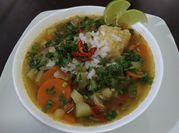 Una foto de espinazo de puerco con arroz