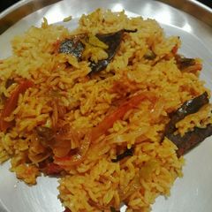 A picture of Tomato biryani.