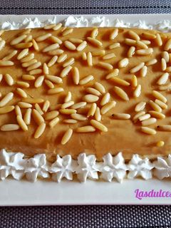 Una foto de Pastel-Cuajada de Galletas y Piñones