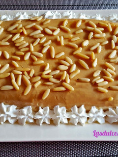 Una foto de Pastel-Cuajada de Galletas y Piñones