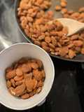 Roasted almond nibbles - warmth enhances flavour