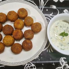 A picture of Protein Rich Cheesy Falafel with Tzatziki Dip.
