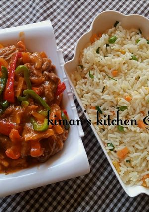 A picture of Chinese rice with shredded beef.