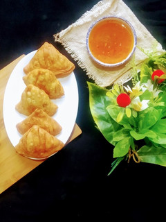 A picture of Chicken vegetables samosay.