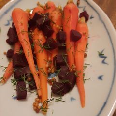 A picture of Quick pickled baby carrots and beets.