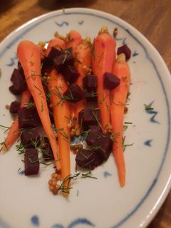 A picture of Quick pickled baby carrots and beets.