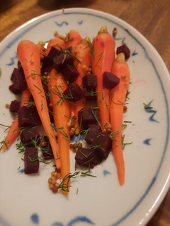A picture of Quick pickled baby carrots and beets.