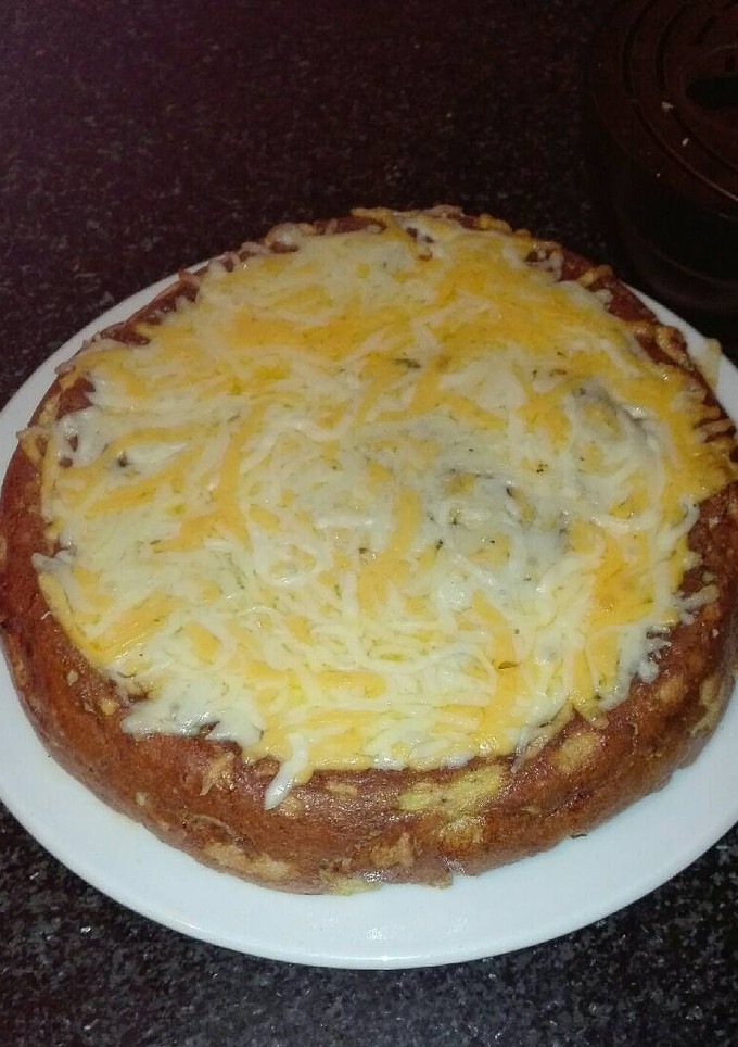 Una foto de Sandwichón pizzero con pollo y salchichas frescas y beicon