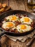 Savory Skillet Eggs with Caramelized Onions and Croutons