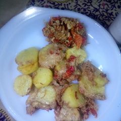 A picture of Fried sweet potato with egg.
