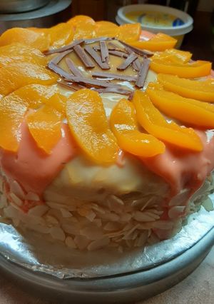 A picture of Chocolate cake covered with custard.