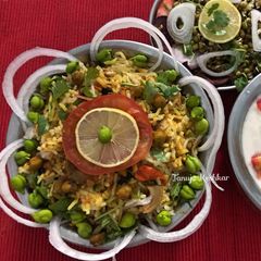 A picture of Raw Green Chana biryani.