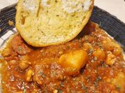 A picture of chickpeas with chorizo