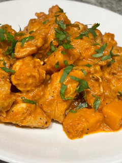A picture of Chicken and Butternut Squash Masala with Basmati Rice.