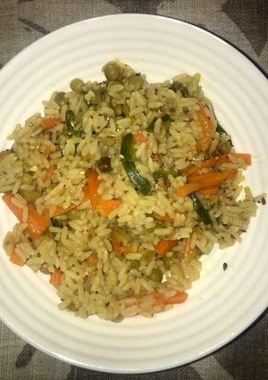 Una foto de Arroz con vegetales y semillas
