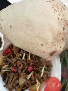 A picture of Lobia Aloo Phali with Chapati.