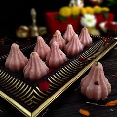 A picture of Gulkand Rose Mawa Modak.