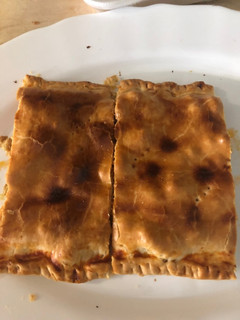 Una foto de Empanada de pollo al curry y bacon