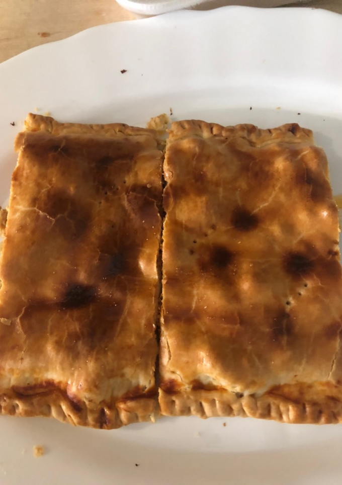 Una foto de Empanada de pollo al curry y bacon