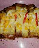Pizza de Avena y harina integral con muzzarella, huevos y ajíes