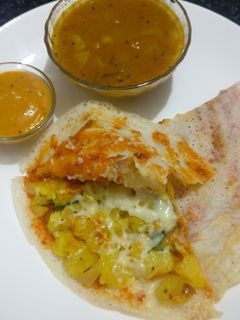 સેઝવાન ચીઝ ઢોસા (schezwan Cheese Dosa Recipe in Gujarati) રેસીપી મુખ્ય ફોટો