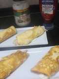 Enrollados de tortilla cuadrada con sobras de pollo