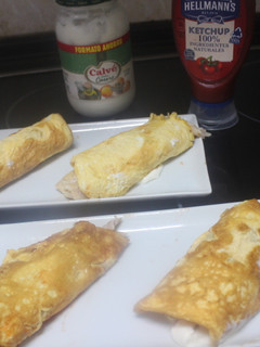 Una foto de Enrollados de tortilla cuadrada con sobras de pollo