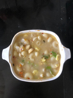 A picture of Babycorn and Macaroni soup.