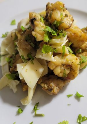 Una foto de Langosta salteada con queso