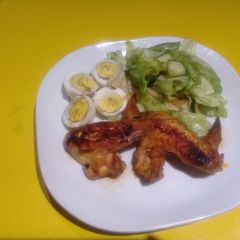 A picture of Grilled hot wings with eggs.