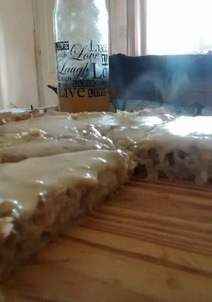 Una foto de Tarta de atún con arvejas y colchón de arroz