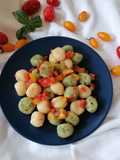 Gnocchi di ricotta bicolore con pomodorini
