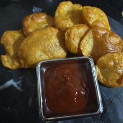 A picture of Patika Bhajiya (Potato Fritters).