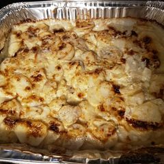 Holmstead Cookin': Baked Onion & Garlic Scalloped Potates A picture of Holmstead Cookin': Baked Onion & Garlic Scalloped Potates.
