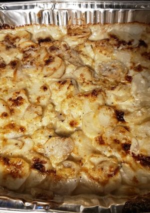 A picture of Holmstead Cookin': Baked Onion & Garlic Scalloped Potates.