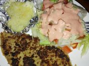 Una foto de milanesa de tomate