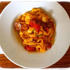 A picture of Seafood pasta with chorizo.