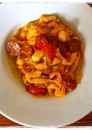 A picture of Seafood pasta with chorizo.