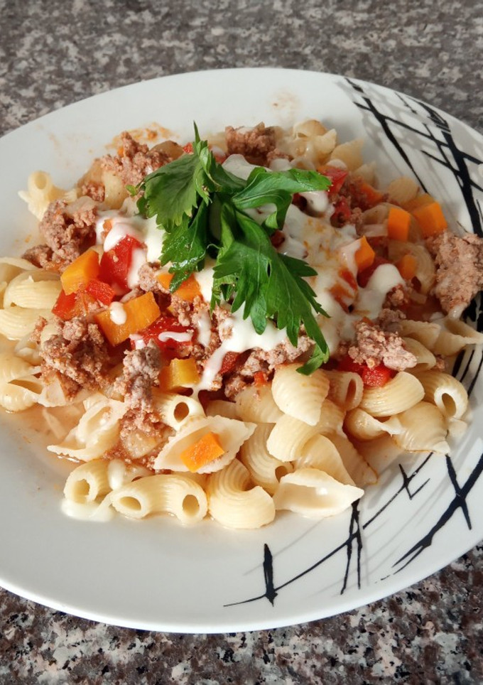 Una foto de Fideos con salsa bolognesa