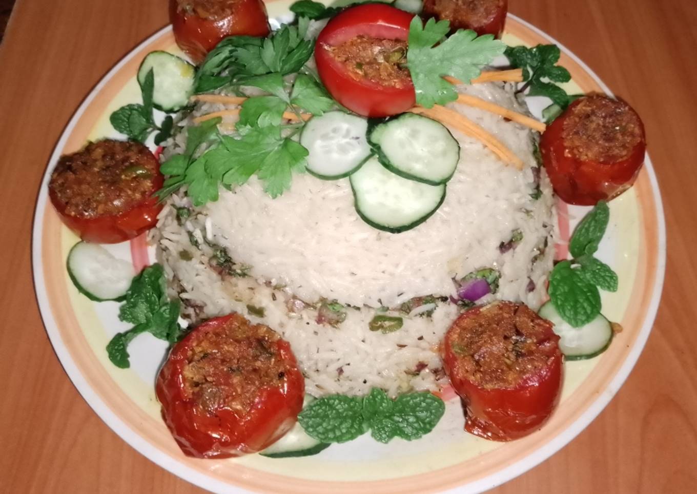 Stuffed tomatoes π
with Arusha rice ππ§π§