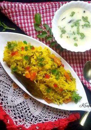 A picture of Veg pulao kadhi.