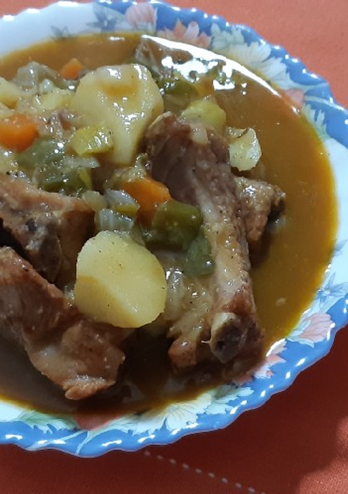 Una foto de Costillas guisadas con toque de brandy