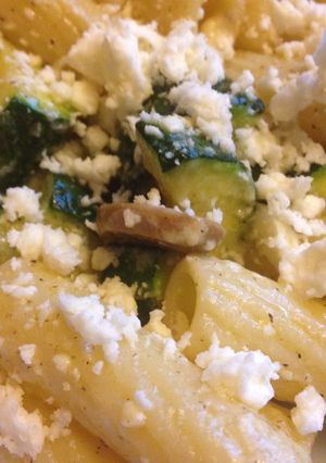 A picture of Buttered Pasta with Zucchini, mushrooms and feta cheese.