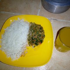 A picture of White rice with green grams.