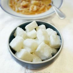 A picture of Rice Cake (Lontong) with Rice Cooker.